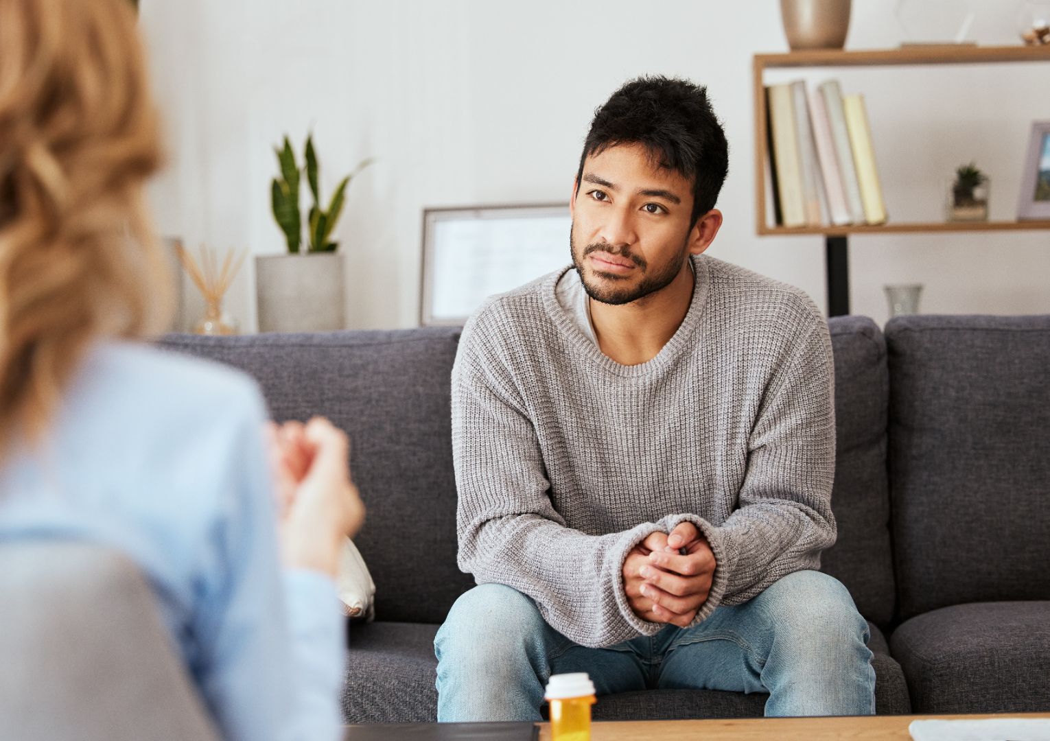 man consults with therapist