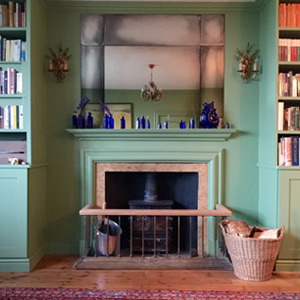 Antiqued mirror overmantel