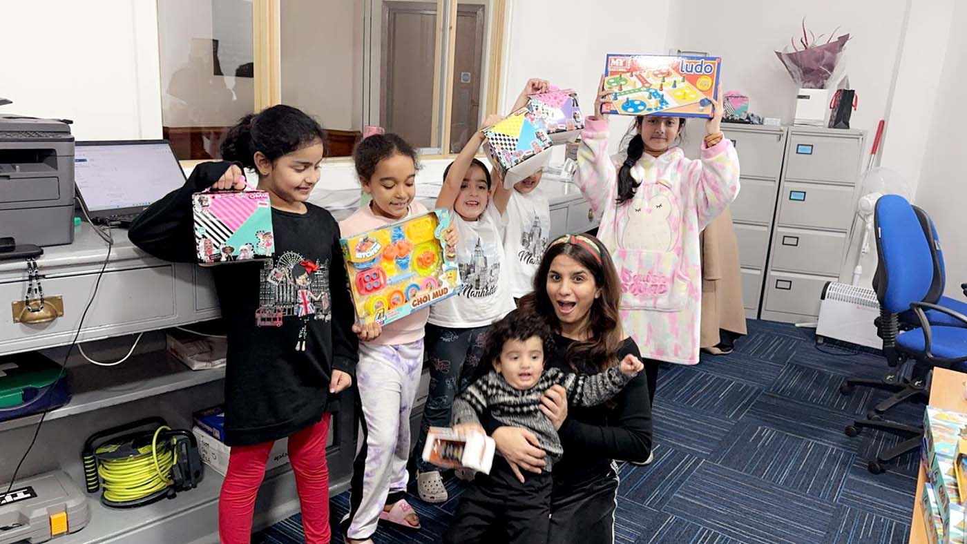 Tenant children with their x mas toys