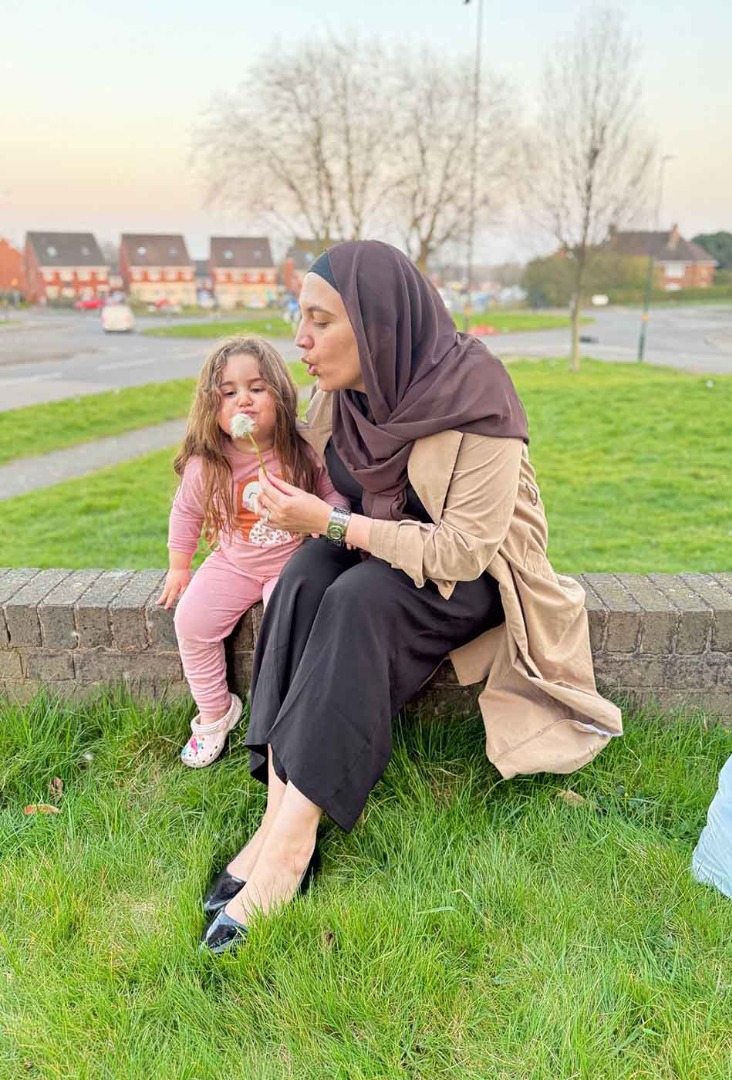 Tenants child playing with team member