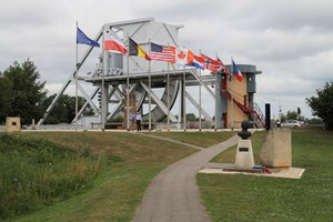 The new bridge across the Caen Canal. The marker stone shows where Major Howard's glider landed less than 50 metres from the bridge