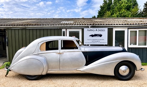 1939 Bentley Corniche aluminium coachwork outside Ashley & James Coachbuilding, Lymington.