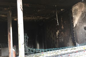 Post fire structural survey on the 12th floor of a residential high rise.