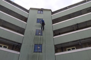 Pressure washing steel cladding for local authority