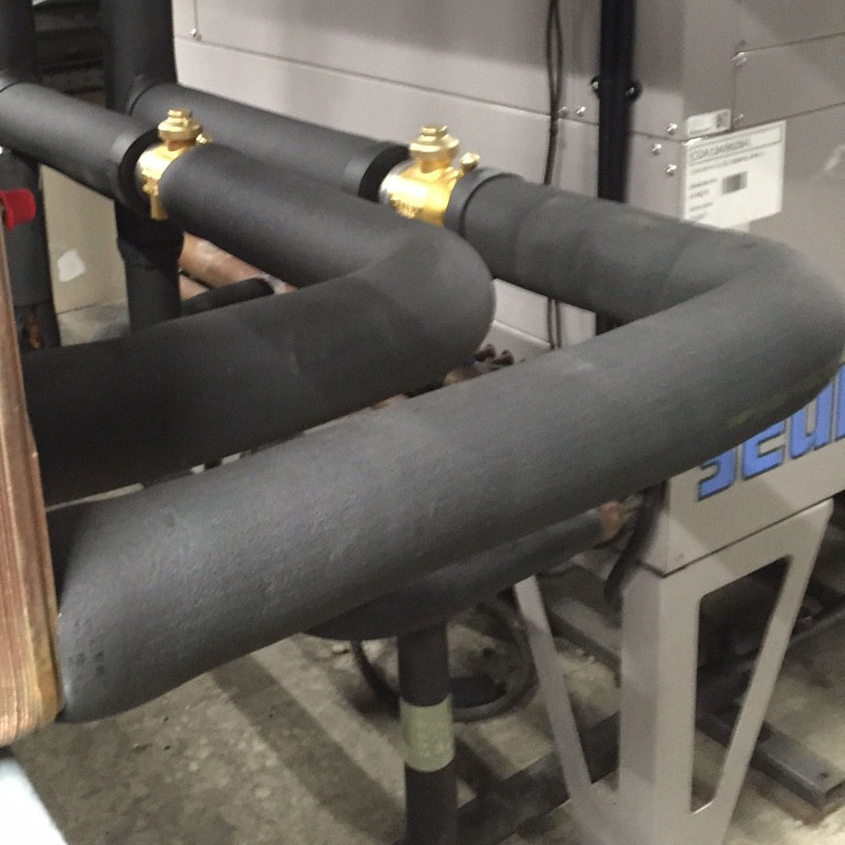 Insulated discharge pipe work at M&S Bankside London