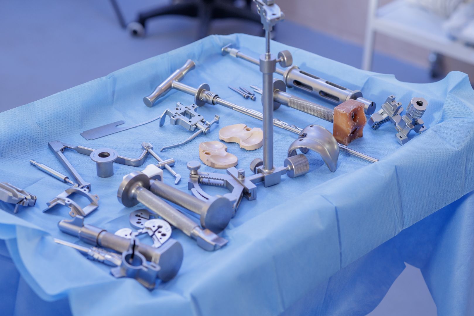 instruments on a blue medical drape