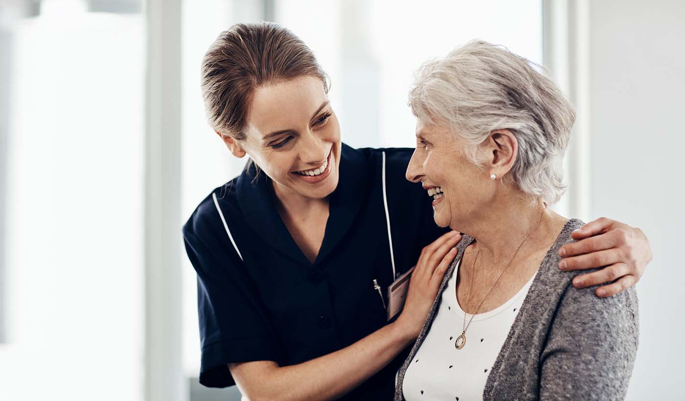 Nurse caring for a senior woman