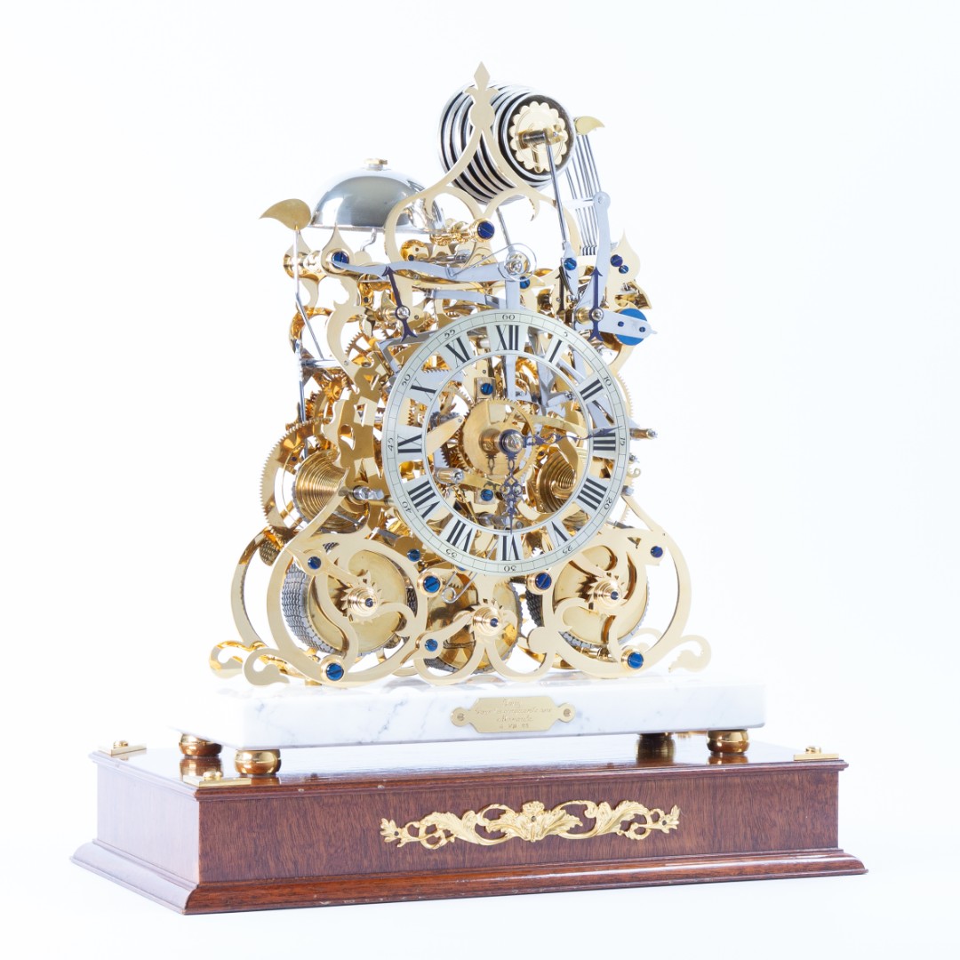 Pre owned three train skeleton clock