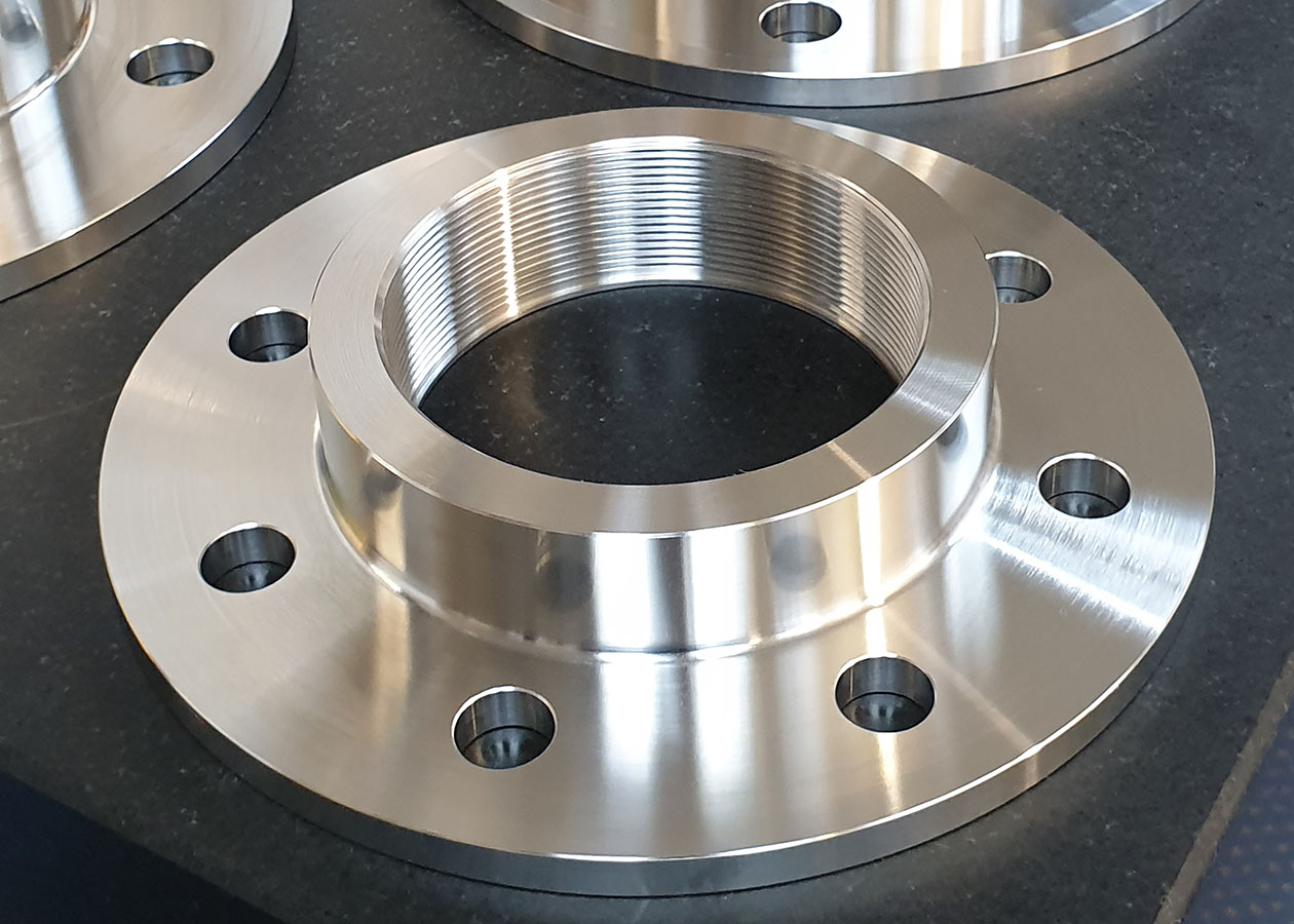 Precision machined metal flange