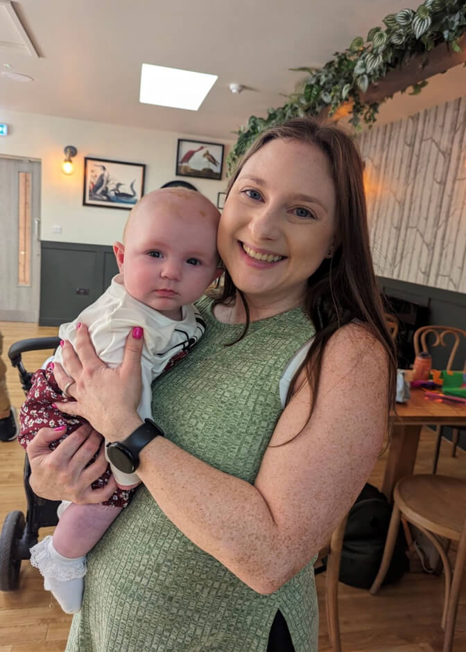 happy mother with newborn