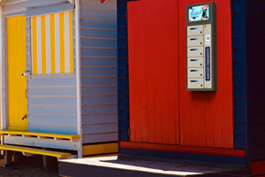 Outdoor charging locker on hut wall