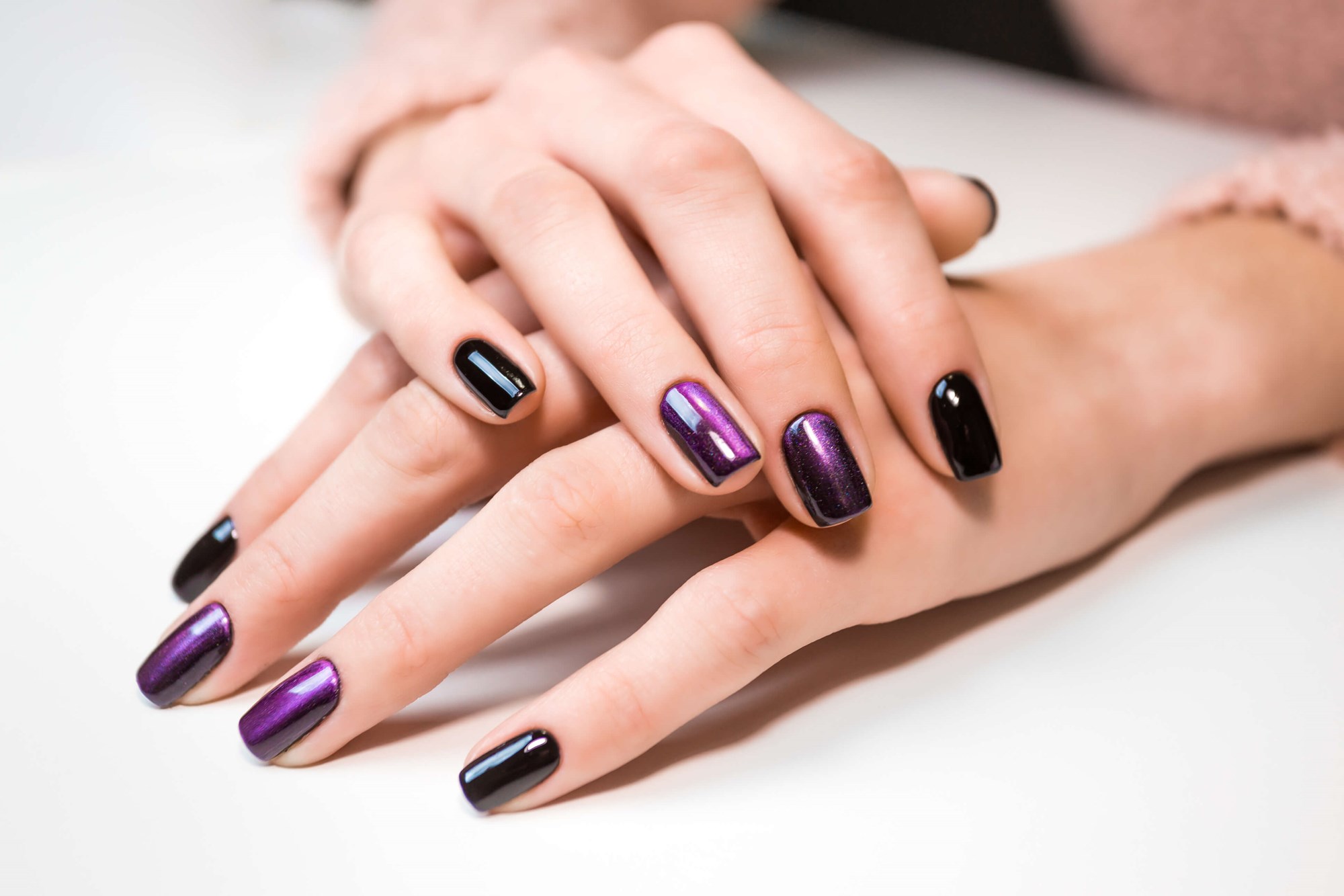 Full set of gel nails with purple gel polish  