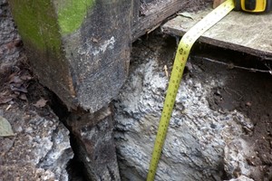 A concrete post repair spur hole needs to be 600mm deep, 190mm wide in untouched virgin ground. Poor soil structure will need a deeper hole to compensate for a 1.8 metre high fence.