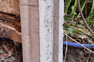 The mortar around the slotted post should be up to the underside of the gravel board level. This is done to reduce movement of the gravel board through natural ground movement.