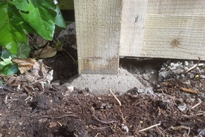 Fence builders fencing need to make sure the first post mix of concrete around the post in the hole has completely hardened before attaching panels & rails. 
