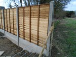 wood fence and concrete