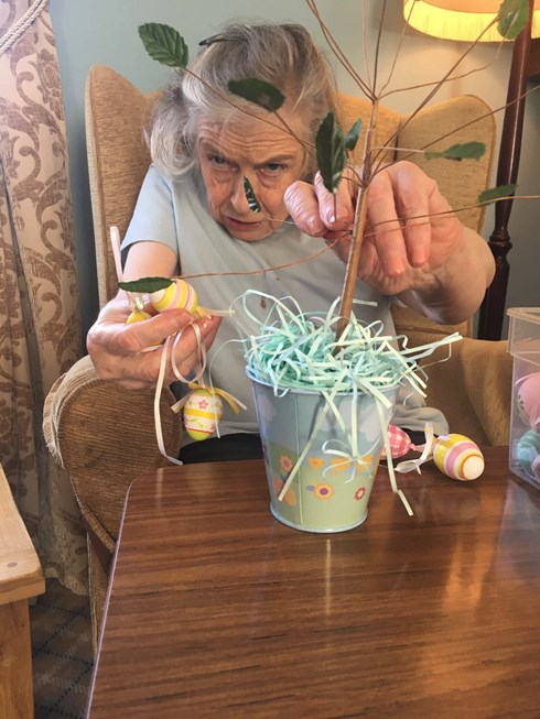 Resident playing with turtle