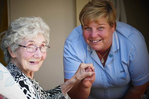 Residents outside with dog, sunny weather and dog