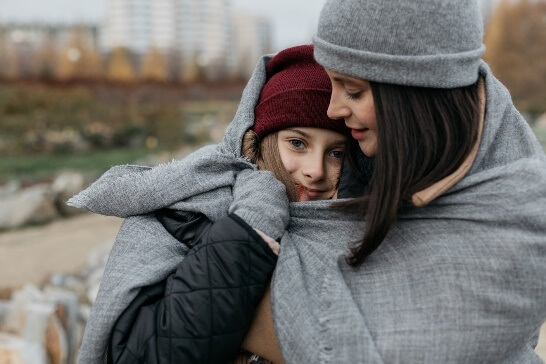 teenager hugging mum