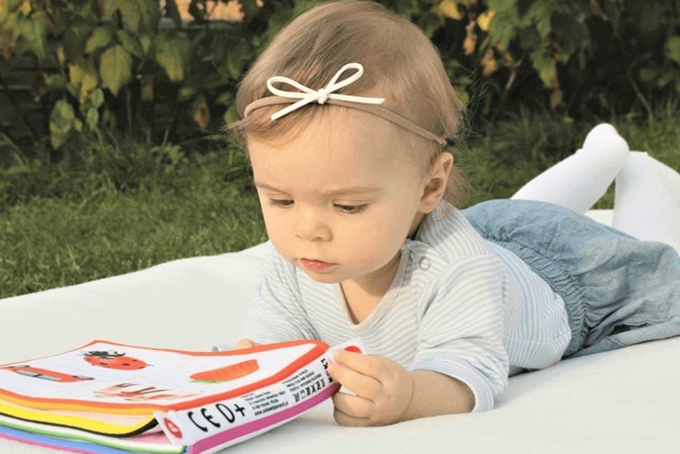 toddler reading a book