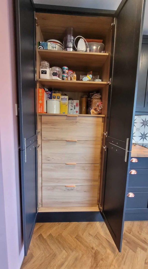 navy blue installed kitchen cupboard inside