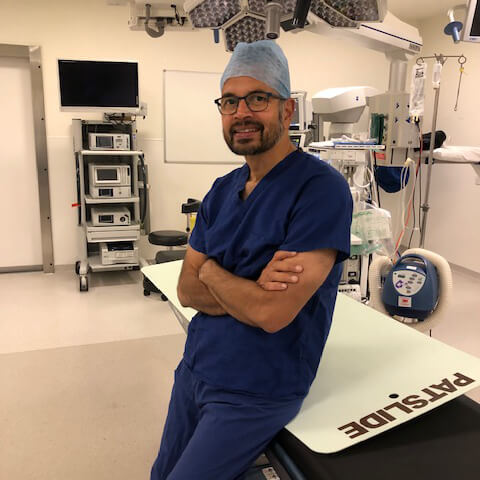 achyuth leaning on bench