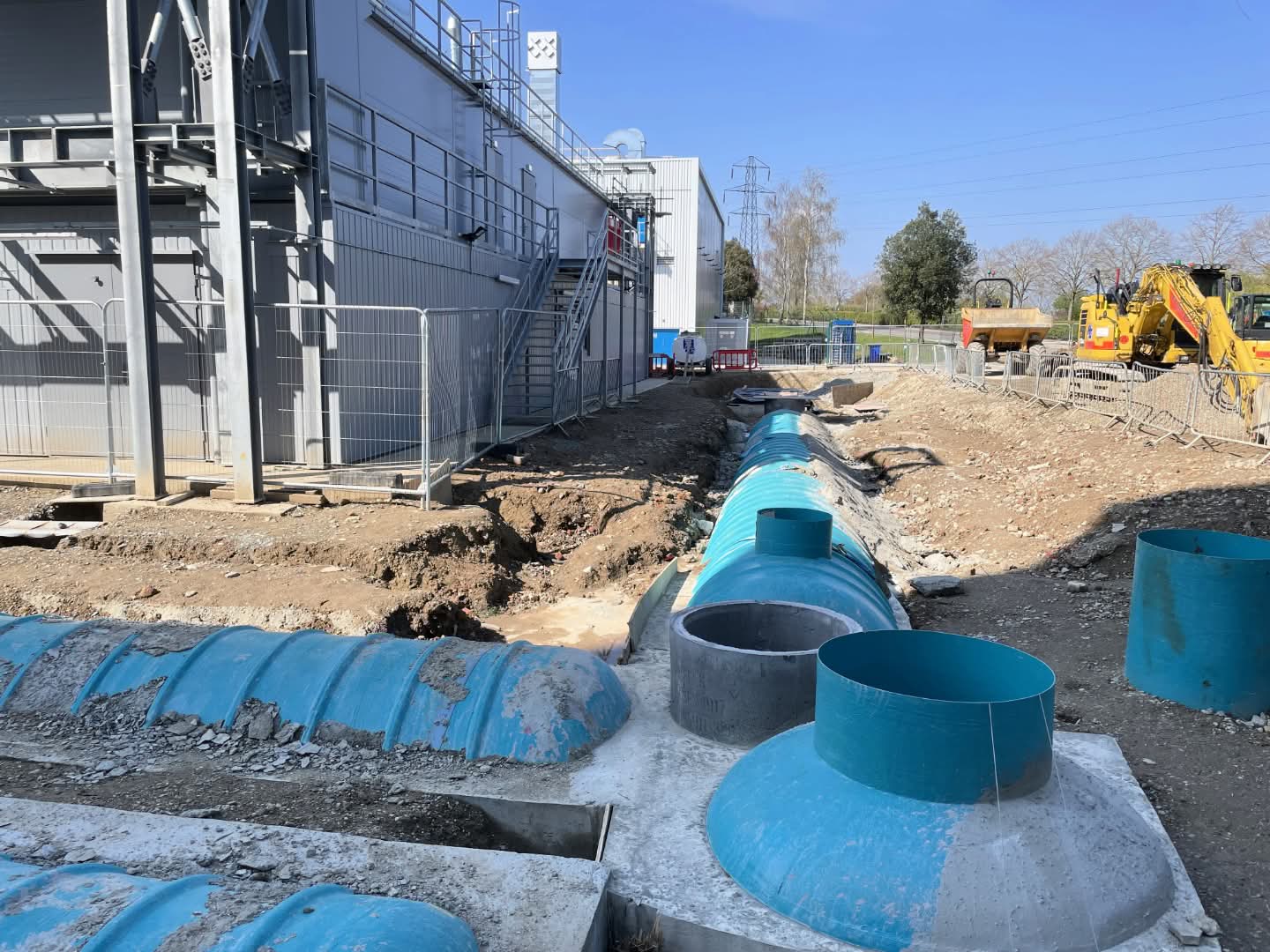 Subterranean containers around building