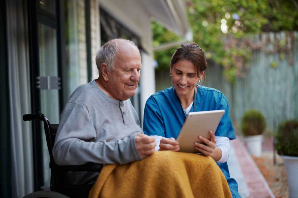Caregiver with old man
