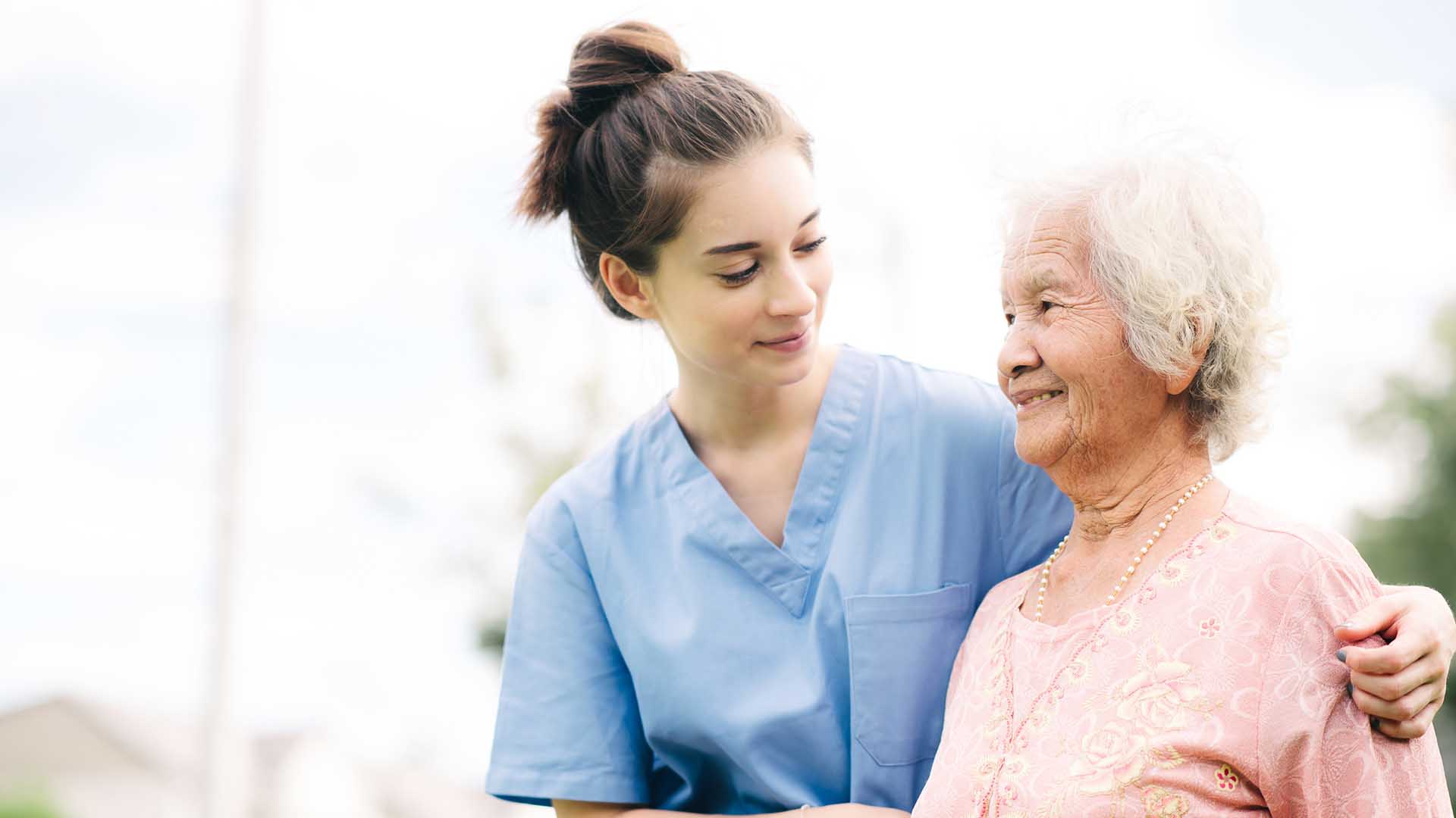 Caregiver with old woman