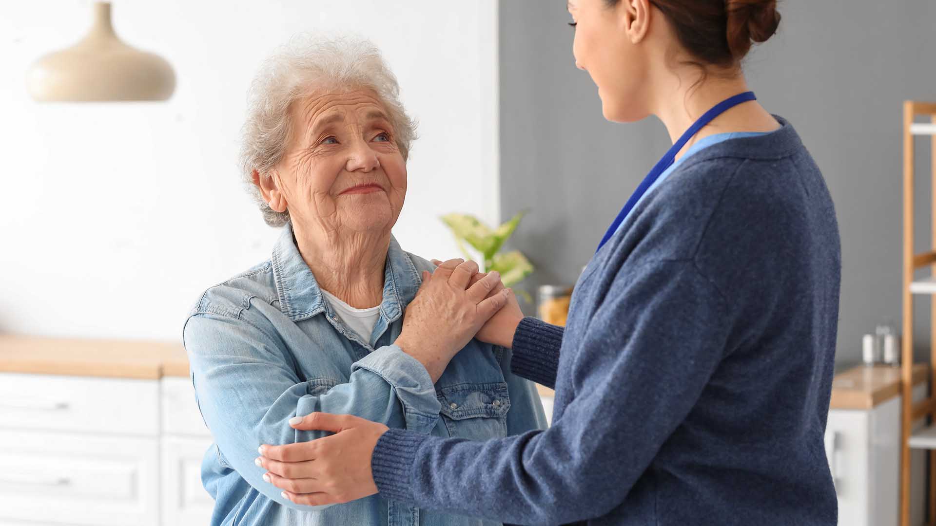 Nurse caring for a senior woman