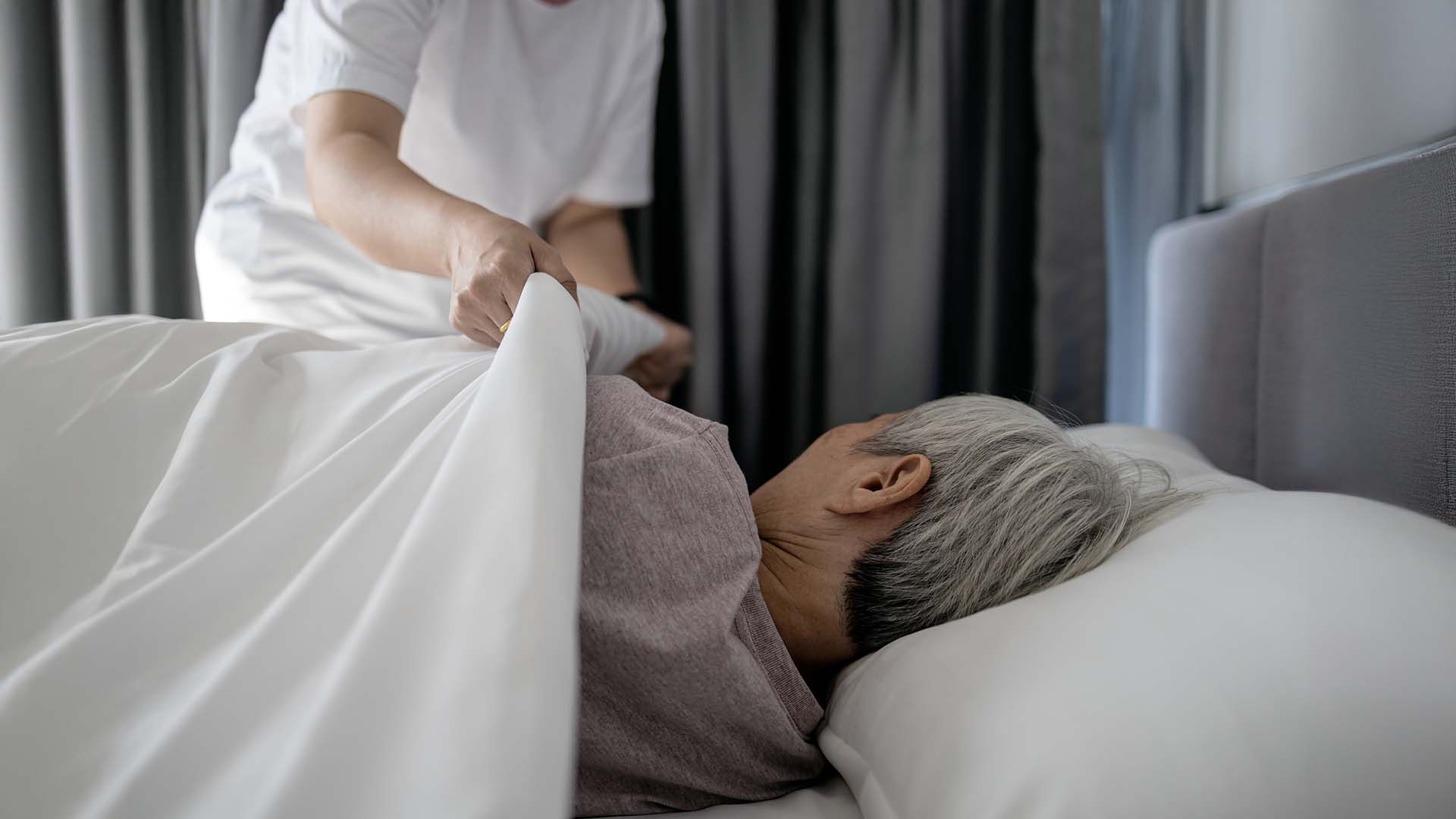 Nurse caring for a senior woman