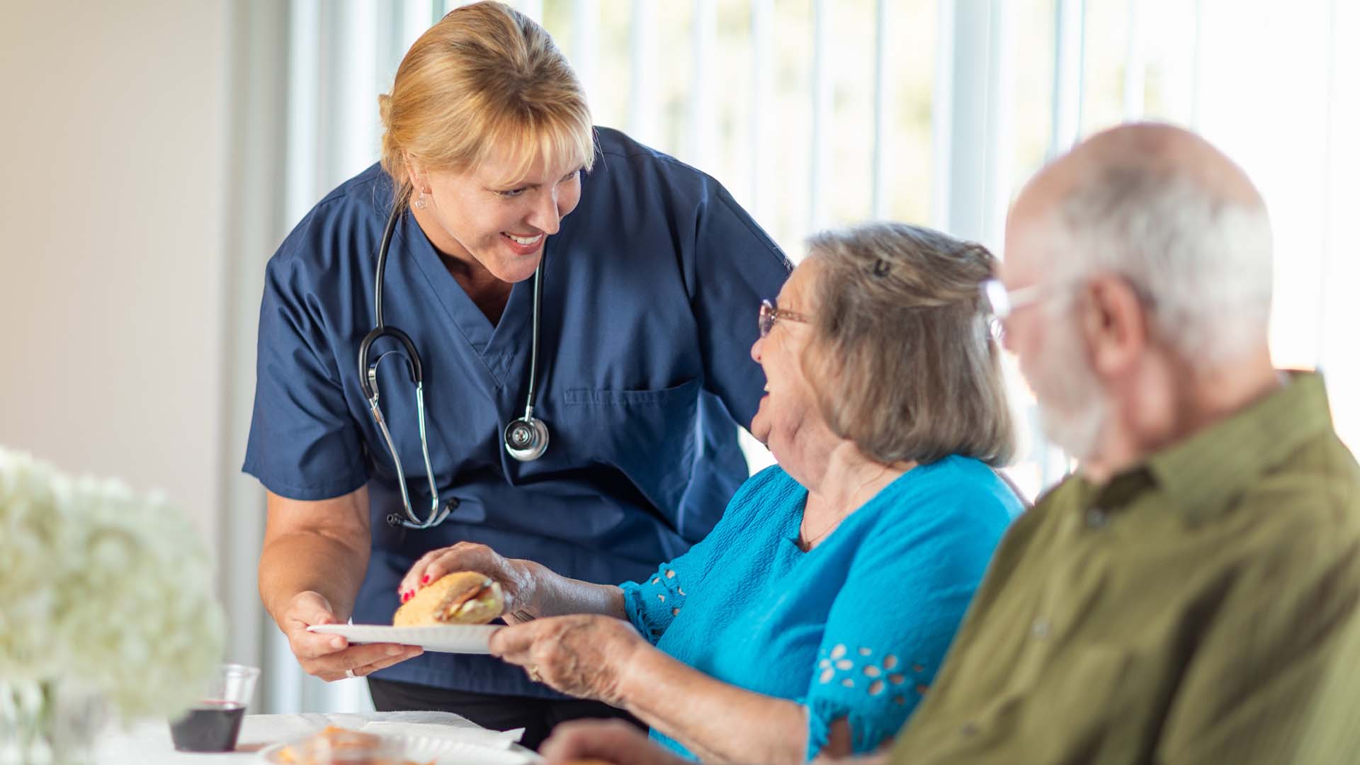 Caregiver with old woman