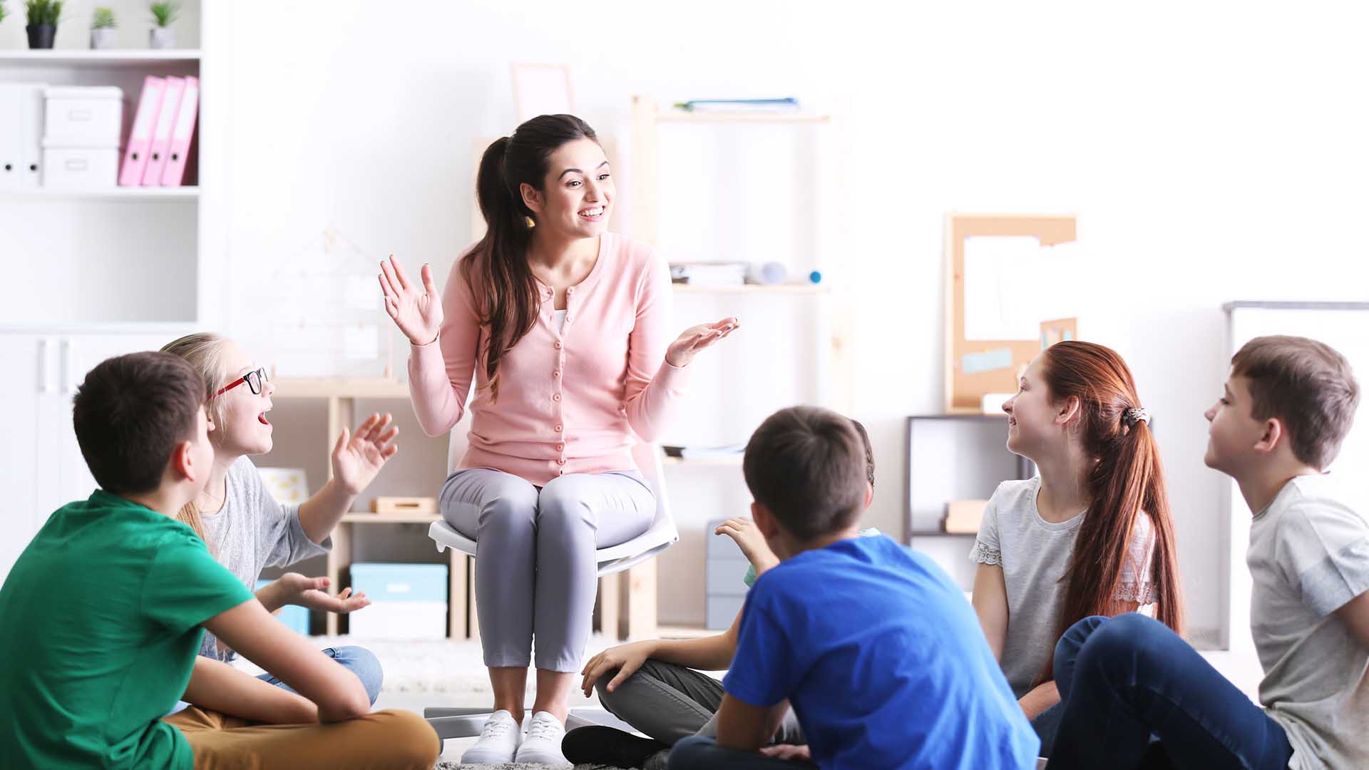 Teacher with children
