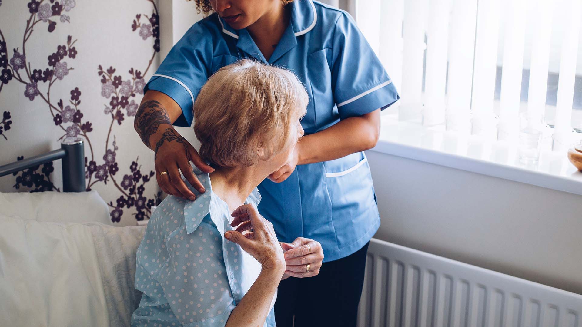 Nurse caring for a senior woman