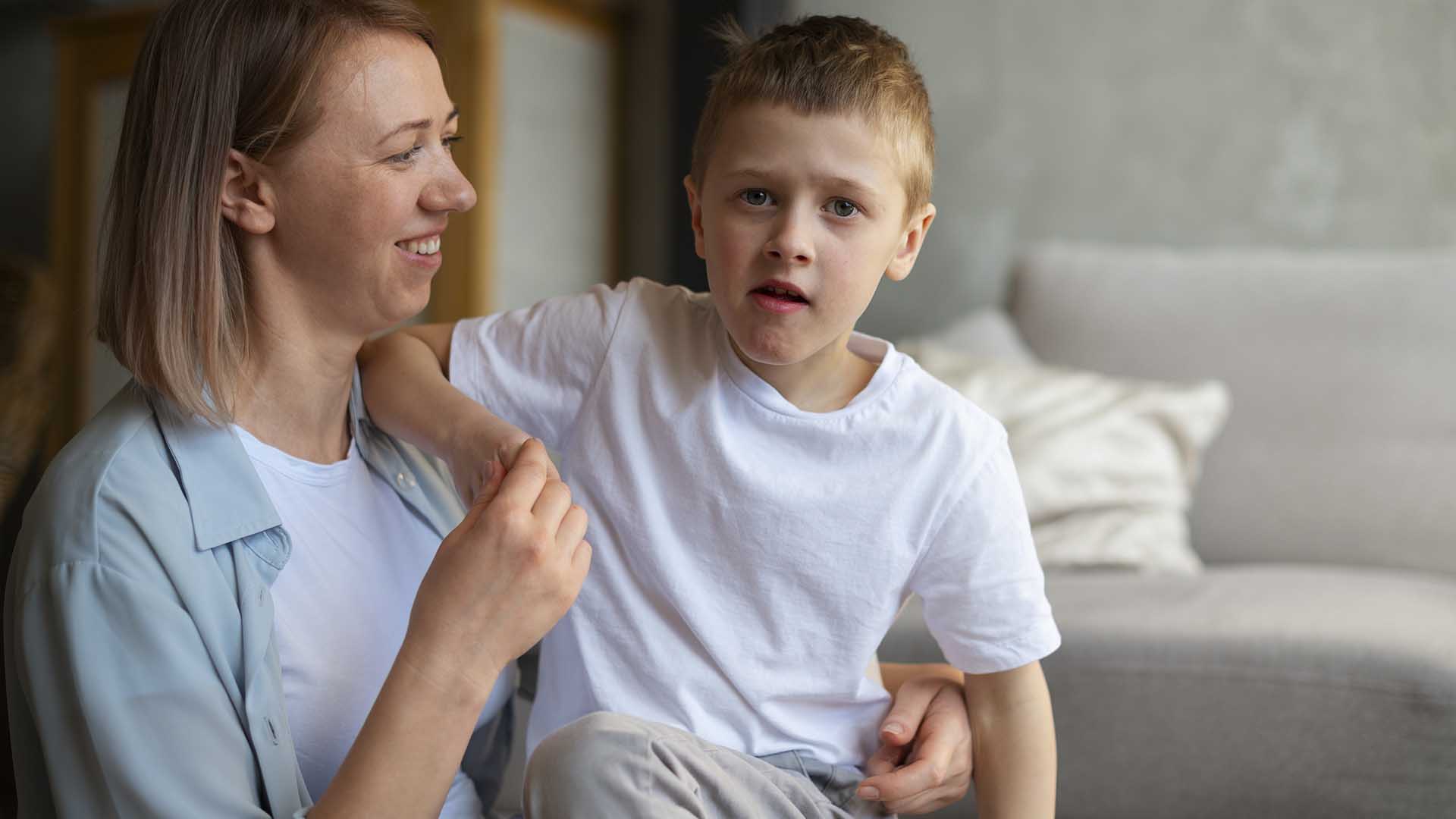 Mother taking care her autistic son home