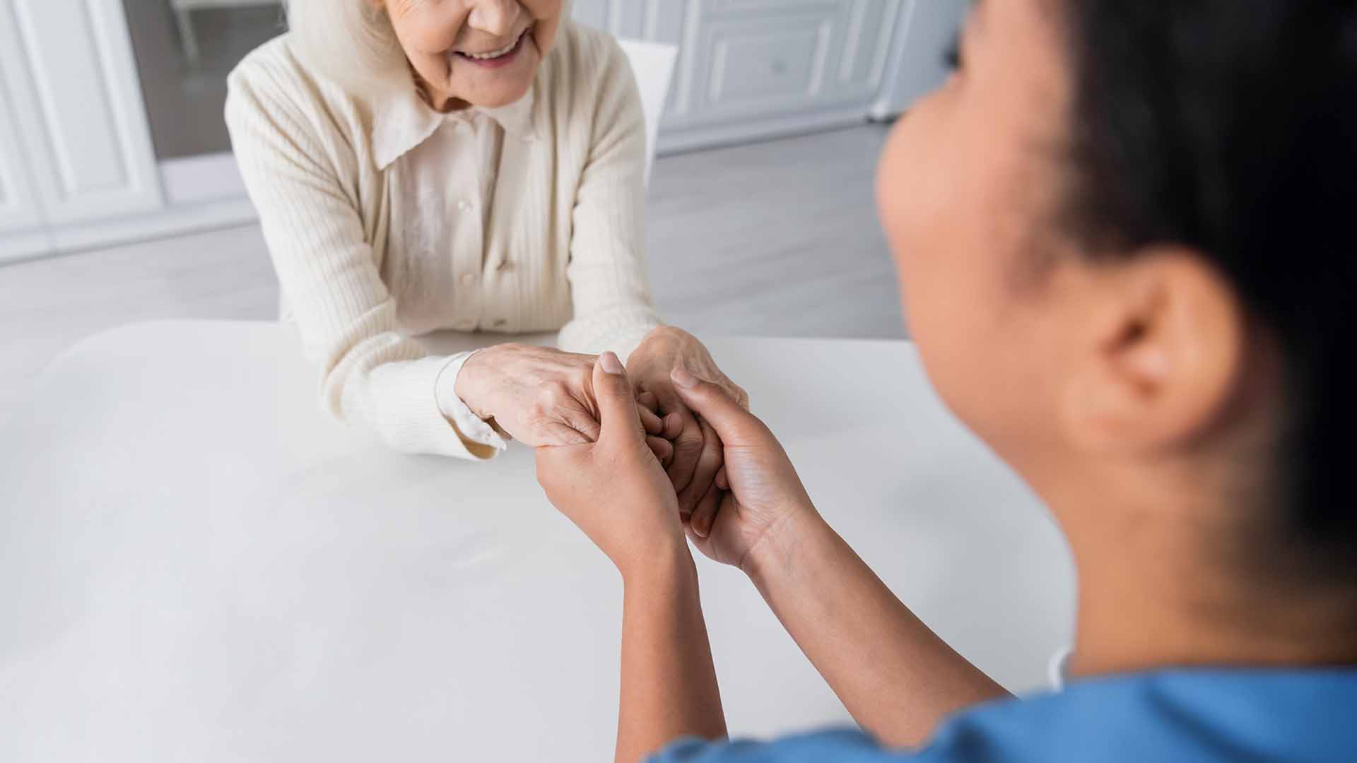 Nurse caring for a senior woman