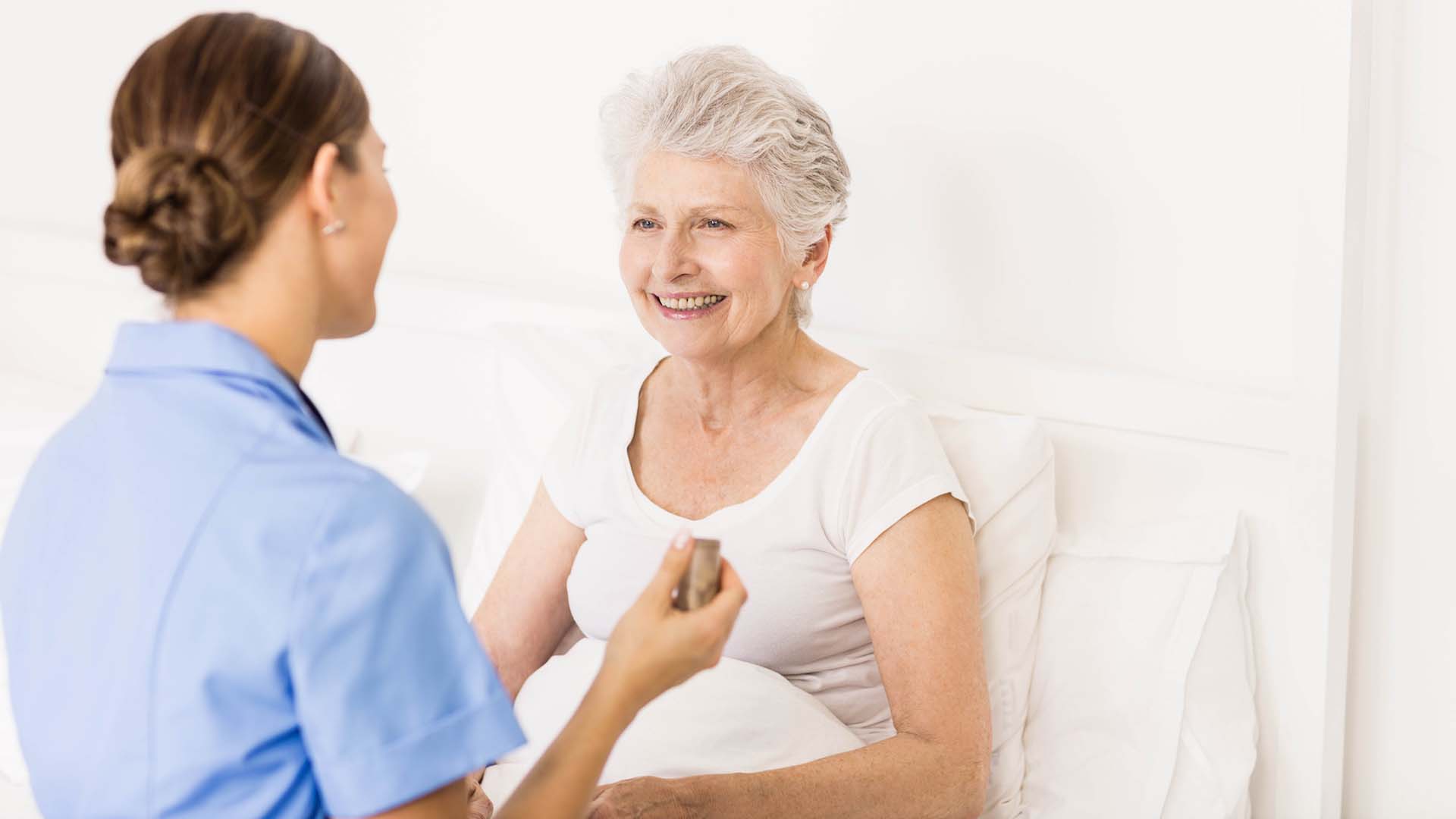 Nurse taking care of senior patient