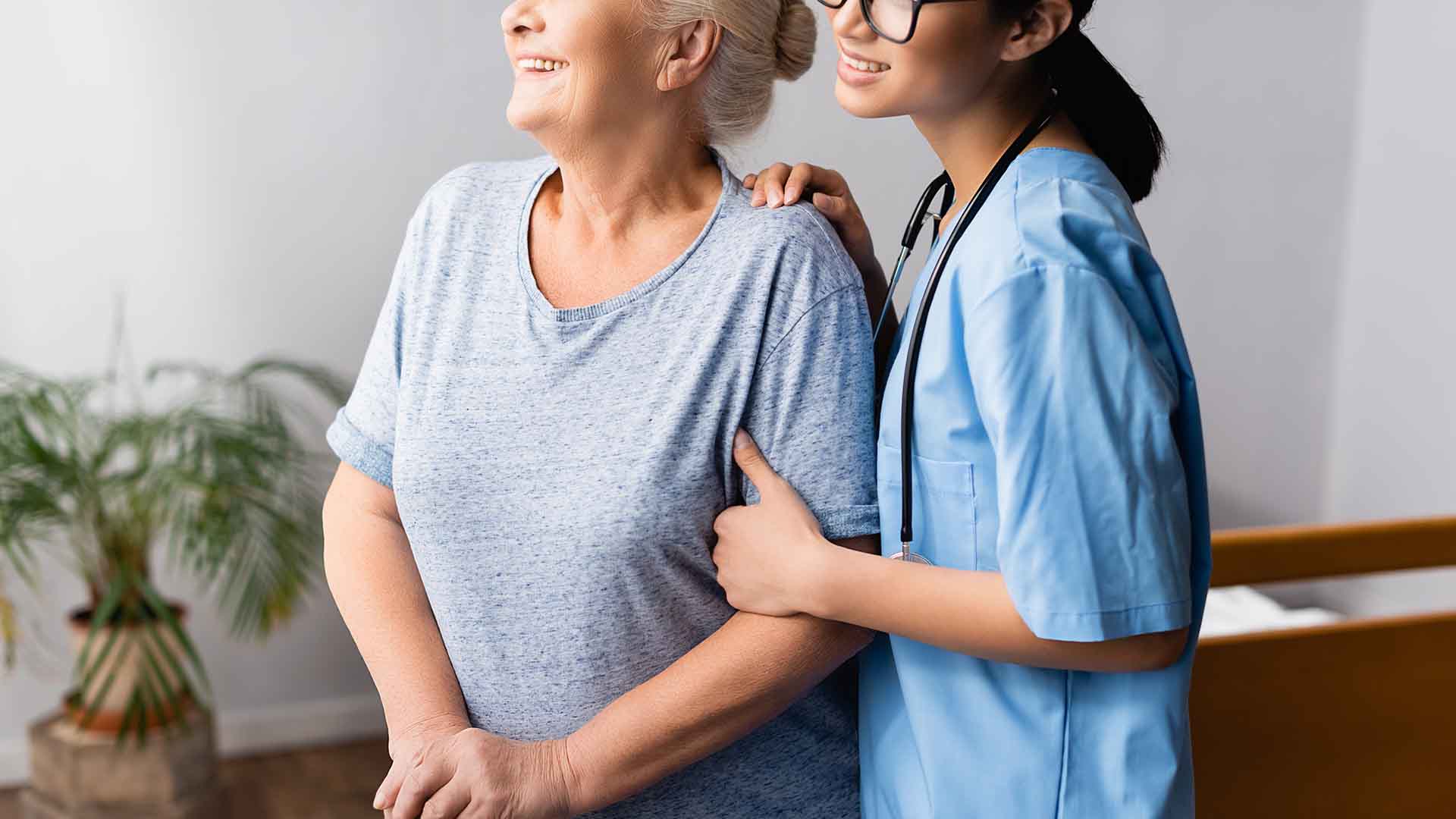 Nurse caring for a senior woman