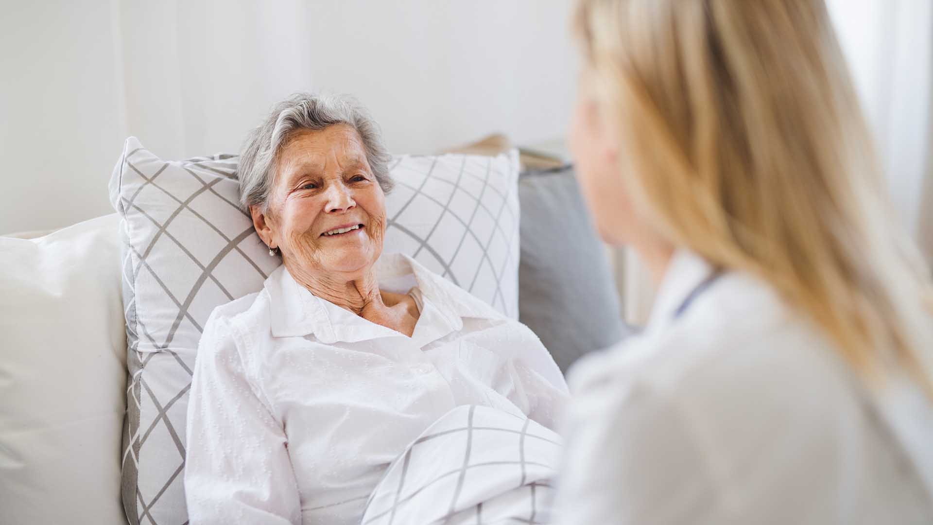 Nurse caring for a senior woman