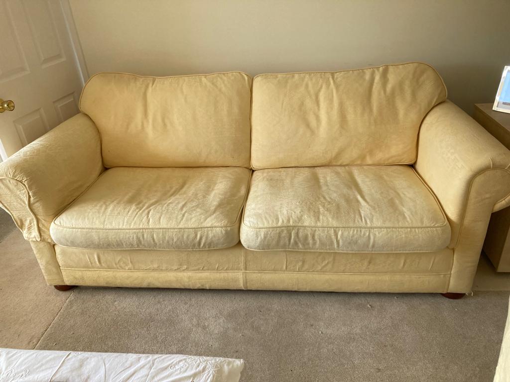 yellow sofa reupholstery before