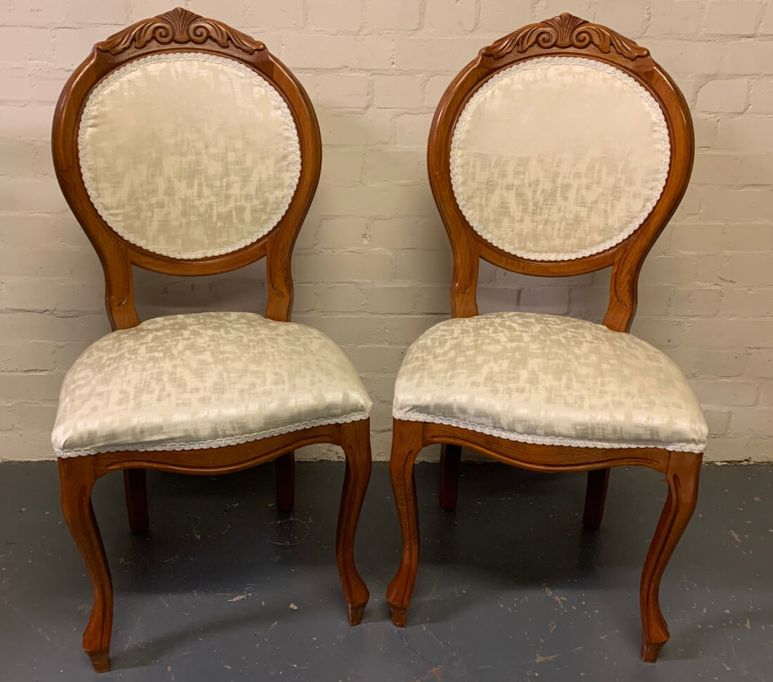two reupholstered chairs