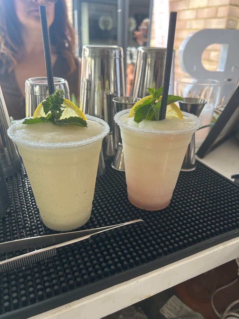 Two cocktails with lemon