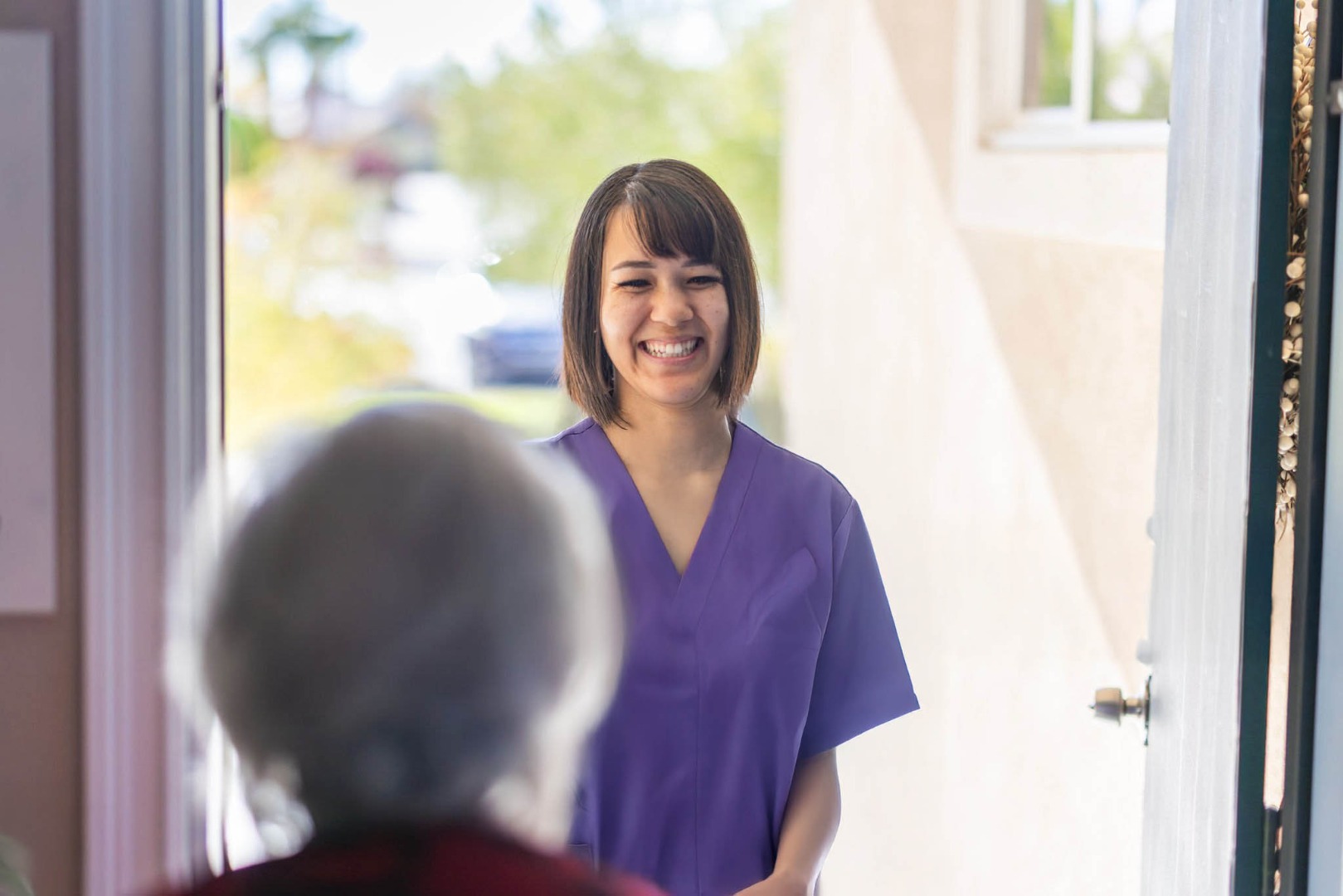 Carers cleaning up for client