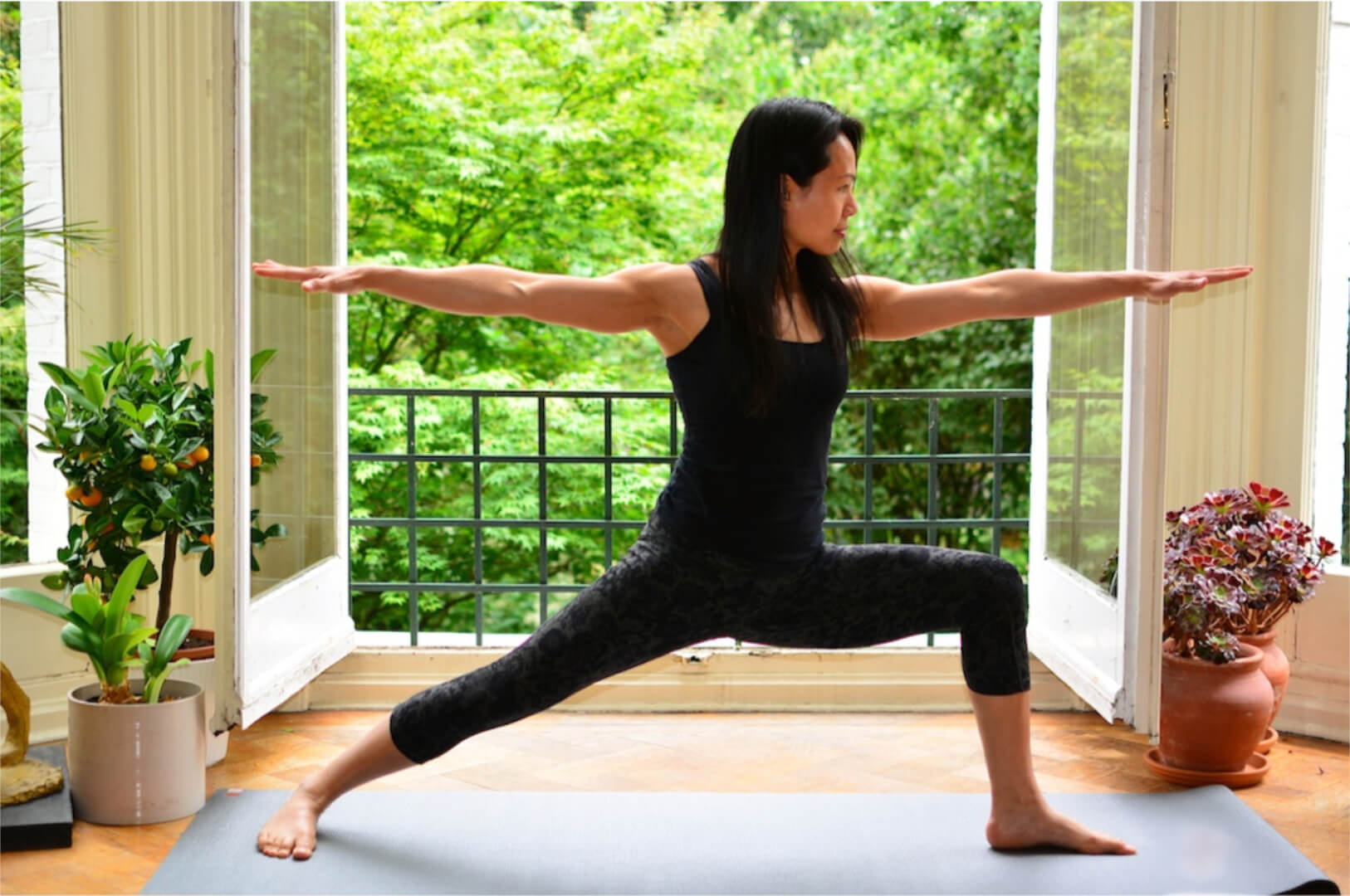 Sui doing yoga pose header