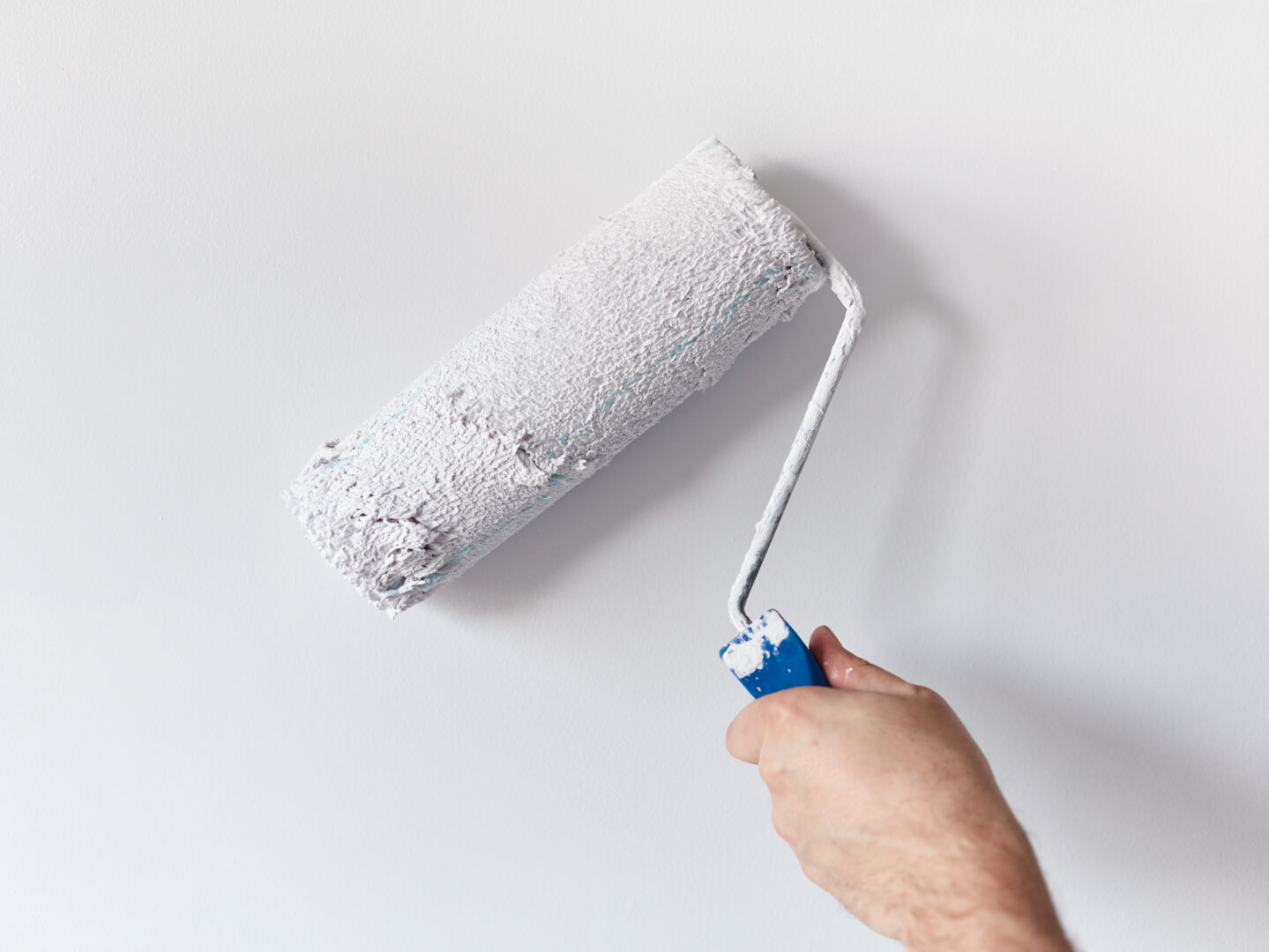 paint roller on wall