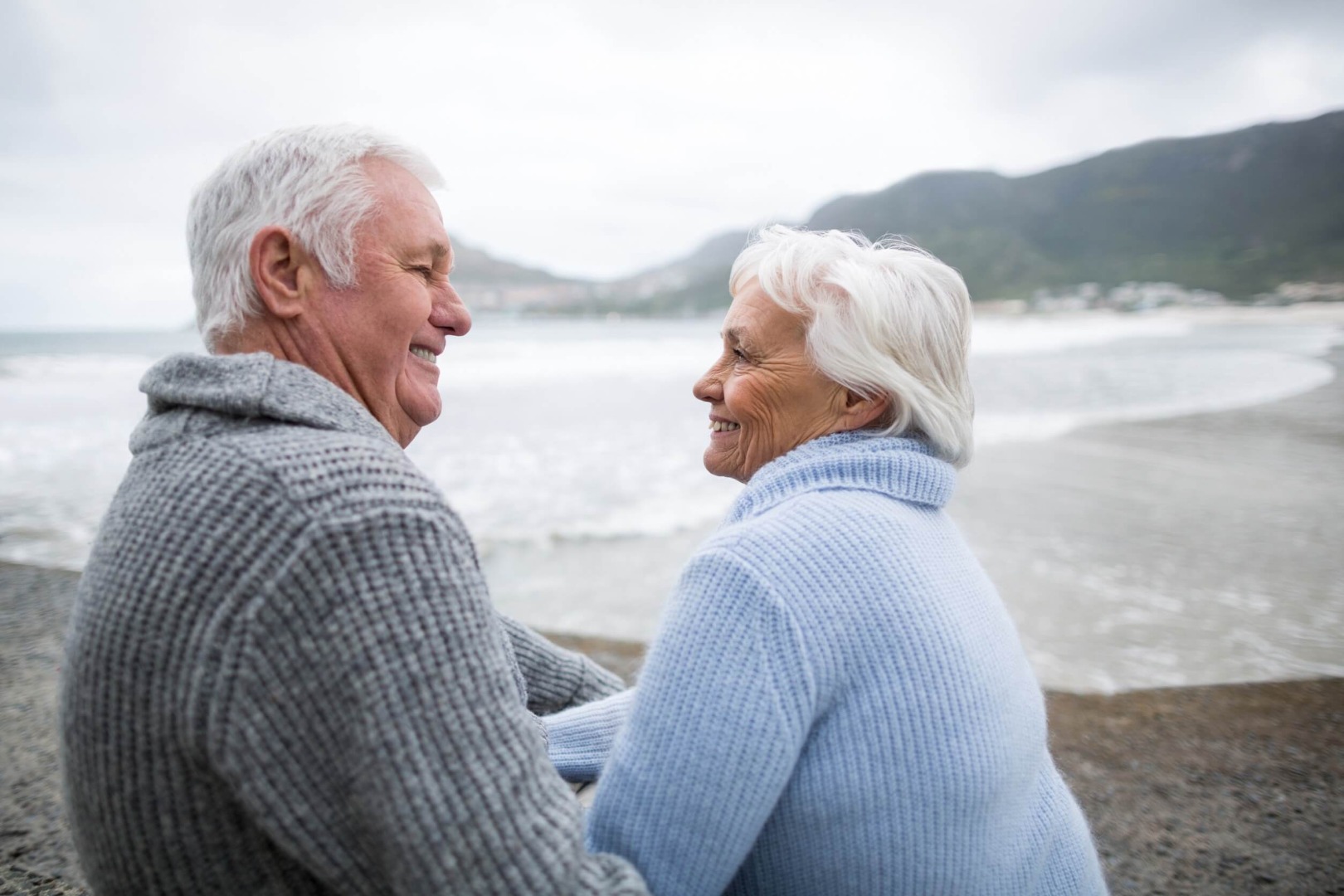 Old couple on beach