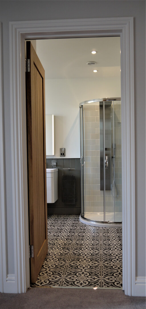 view of bathroom through door