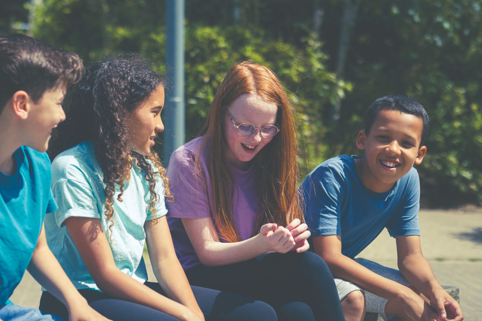 Group outdoors are speaking