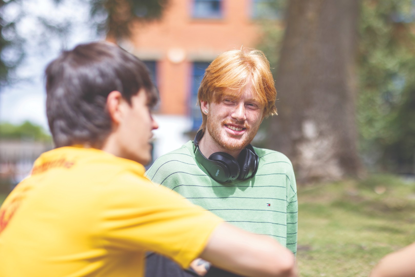 Teens sitting and speaking