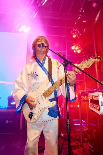 Man singing with guitar
